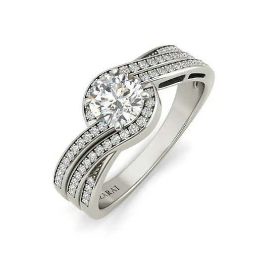 The Seacrest sterling silver engagement ring, currently on clearance, features a prominent central diamond gracefully complemented by smaller diamonds in an exquisite twisting band design.