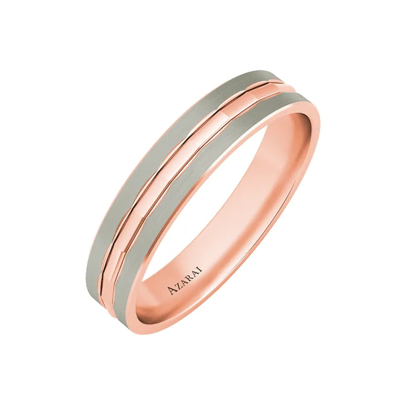 The Stewart 9kt gold wedding band showcases a two-tone design, featuring a polished silver band running through the center and brushed 9kt gold edges.