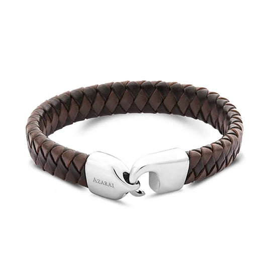 The Lynk leather bracelet for men showcases a braided brown leather design and a silver clasp engraved with "AZARAI," elegantly packaged in gift-ready presentation. Additionally, it comes with the benefit of convenient nationwide delivery.