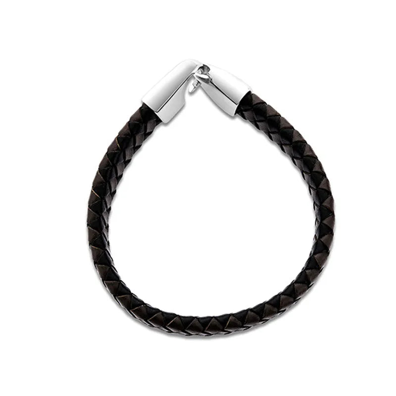 The Lynk leather bracelet for men is a black braided leather accessory featuring a silver clasp, set against a white background. It is ideal for gift packaging and available for delivery across the nation.