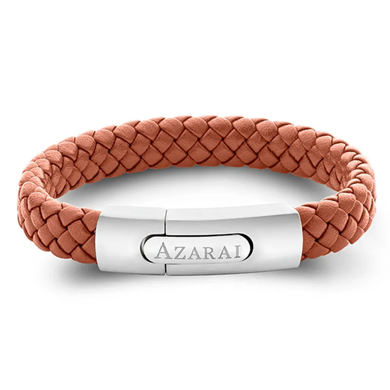 The Nemo leather bracelet for men is crafted with braided brown leather and features a silver clasp engraved with "AZARAI." It is elegantly presented in gift packaging.