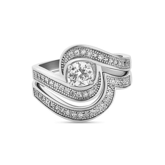 The Katrina sterling silver bridal set ON CLEARANCE showcases a breathtaking diamond ring, featuring a central stone encircled by wavy bands adorned with smaller diamonds.