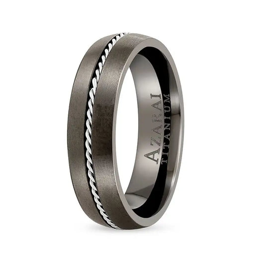 A men's Marlowe black titanium wedding band with silver inlays.