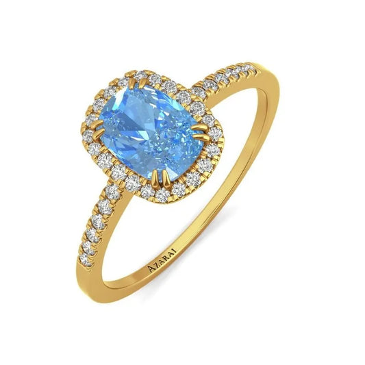 The Adeline 9kt gold engagement ring showcases a breathtaking large blue gemstone, elegantly accented by glistening diamonds along the band.