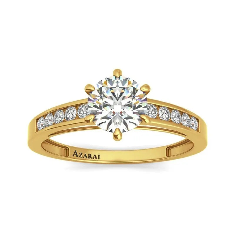 The Anna 9kt gold engagement ring showcases a magnificent large round diamond centerpiece, beautifully enhanced by smaller diamonds elegantly placed along the band.