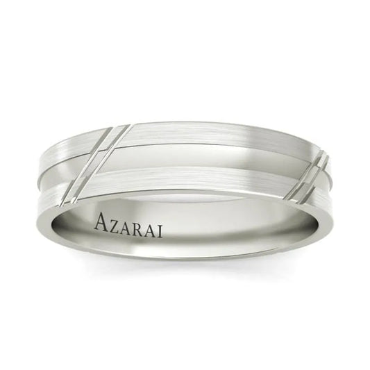 Introducing the Arlington sterling silver wedding band, featuring engraved lines and the word "AZARAI" elegantly etched on the inside, ideal for those seeking a timeless design.