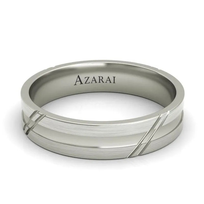 The Arlington sterling silver wedding band, inspired by Arlington's design elements and engraved with the brand name "Azarai" on the inside, showcases a simple yet elegant pattern of engraved lines for men.