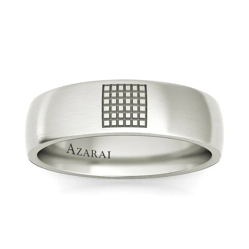 The Aspen sterling silver wedding band features a grid pattern on top, reminiscent of the serene beauty of an Aspen forest, and is inscribed with "AZARAI" inside. This sophisticated men's ring is crafted for elegance and style.