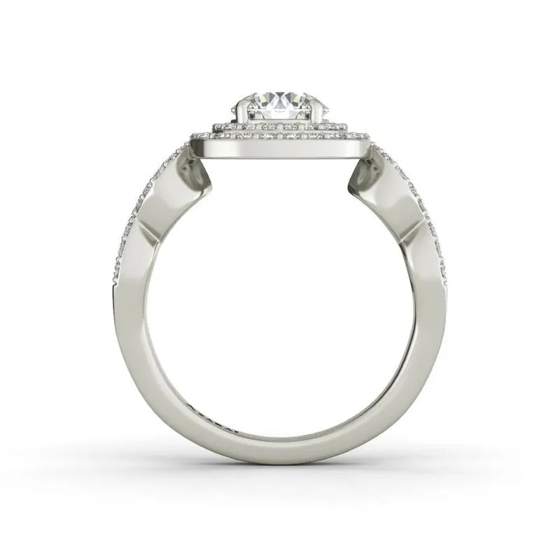 The Astrid sterling silver engagement ring features a stunning large central diamond, complemented by smaller diamonds adorning the band, seen from the side.