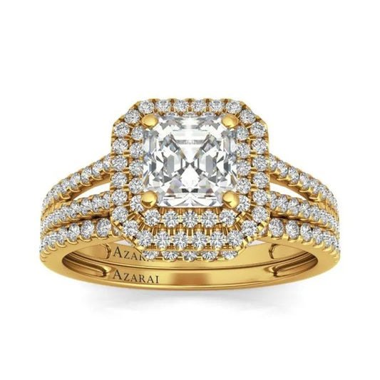 A square-cut diamond ring from the Beatrix 9kt gold bridal set, with a double halo and a triple band, encrusted with smaller diamonds.