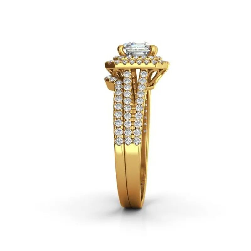 A Beatrix 9kt gold bridal set with a central large diamond flanked by vertical rows of smaller diamonds on a white background.