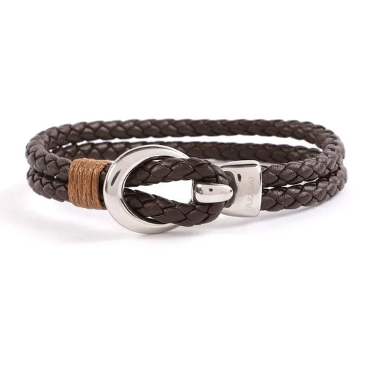 The Beck leather and stainless steel men's bracelet has a brown braided design, featuring a stainless steel hook clasp and a small wrapped section for added style.