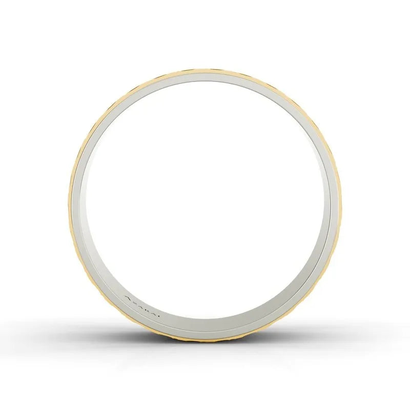 The Berkeley 18kt gold wedding band for men features a minimalist hoop design, crafted with a sleek surface and a subtly textured edge, offering a modern aesthetic.