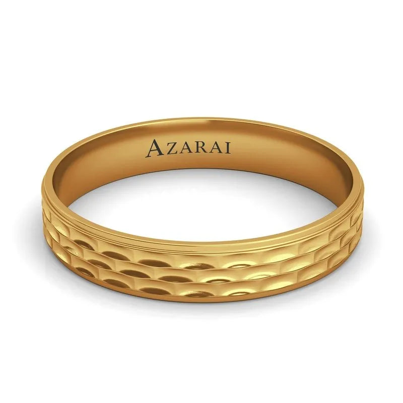 The Brunswick 9kt gold wedding band showcases a textured pattern and has the elegant "AZARAI" inscription on the inside, making it an ideal choice for men's weddings.