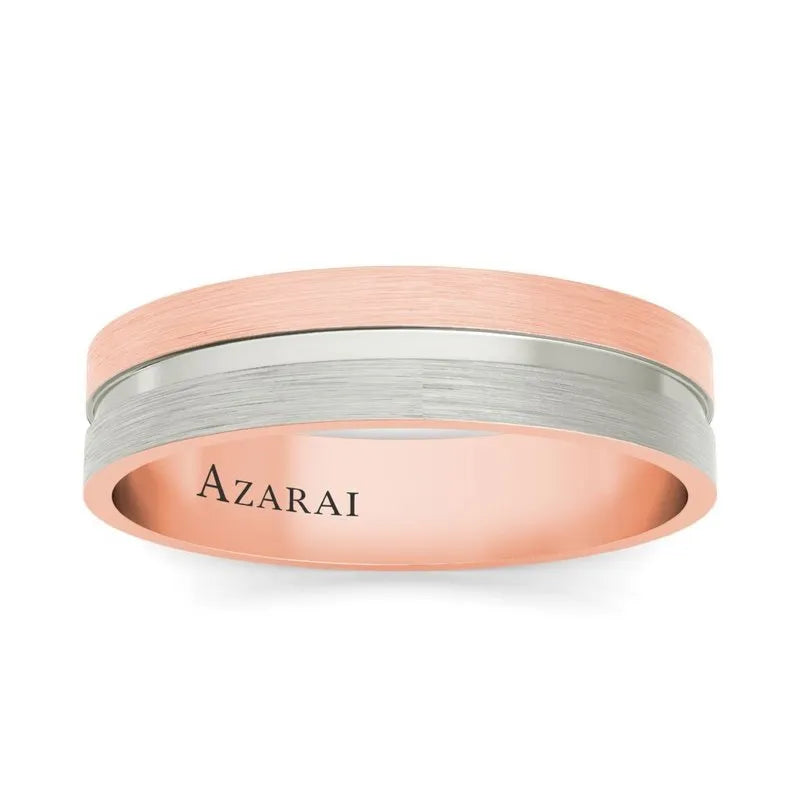 The Chandler 18kt gold wedding band boasts a sophisticated two-toned design, featuring a brushed rose gold and silver band. This elegant men's ring is engraved with "AZARAI" on the inside.