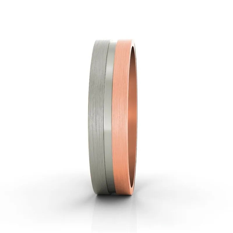 This Chandler 18kt gold wedding band for men features a dual-tone design with a brushed finish, combining gray and copper bands set against a plain white background.