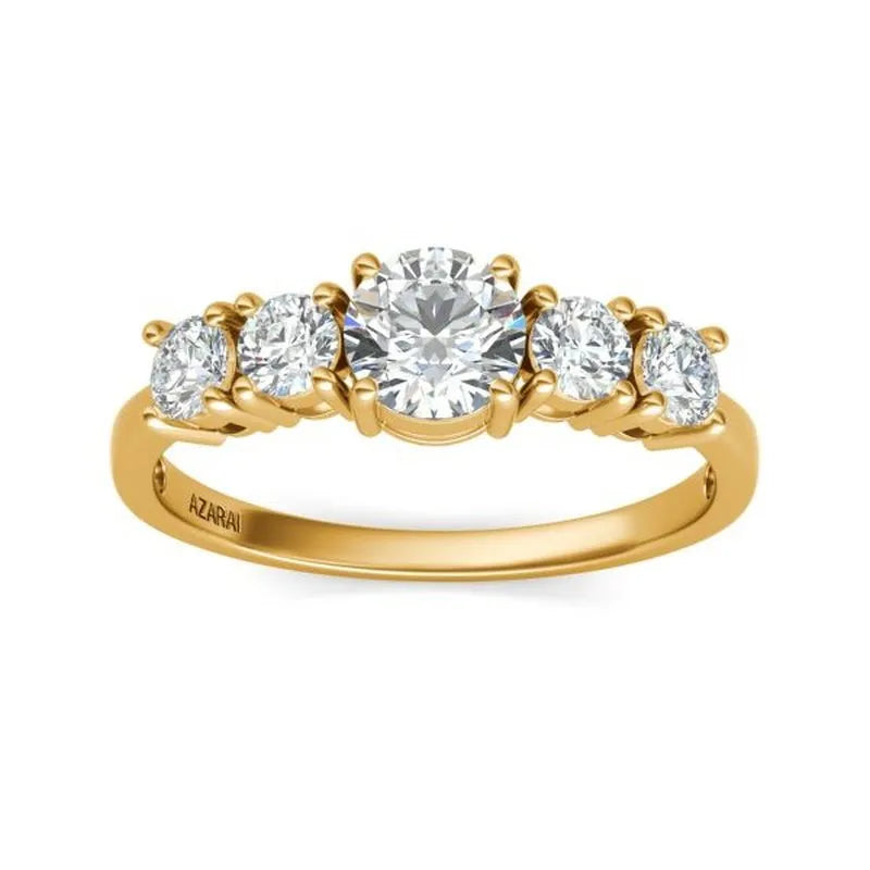 The Circa 9kt gold engagement ring boasts a central round diamond complemented by four smaller diamonds on either side, embodying timeless elegance and charm.