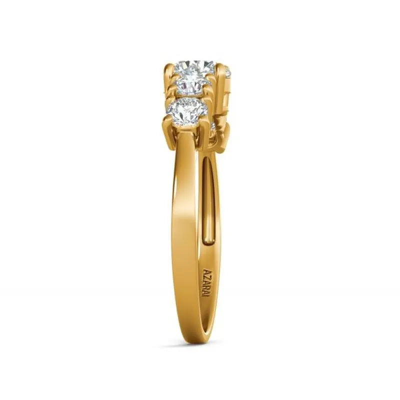 The Circa 9kt gold engagement ring showcases three round diamonds in a classic prong setting on a plain band, exuding timeless elegance from every angle.