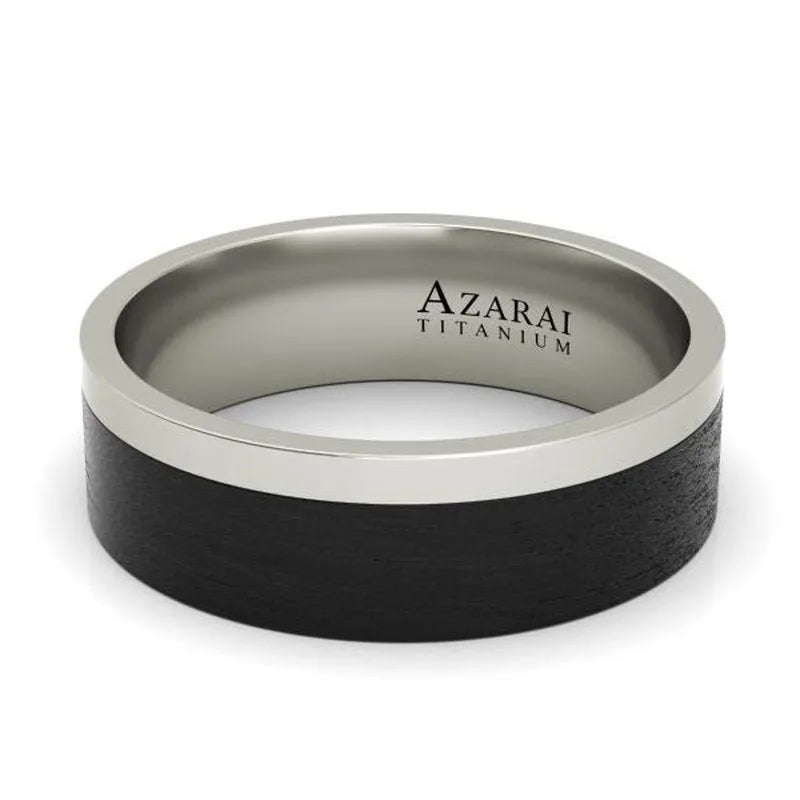 A matte black titanium ring, perfect as a men's wedding band, features "Downing Carbon Fibre Wedding Band" inscribed inside the band.