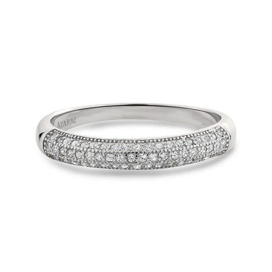 The Faye sterling silver wedding band showcases an exquisite design adorned with small white diamonds.