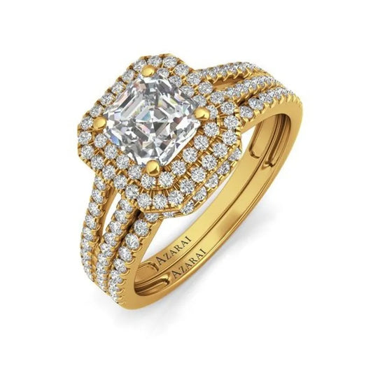 The elegant Beatrix 14kt gold bridal set includes an engagement ring that showcases a prominent square diamond surrounded by smaller diamonds on a triple band.