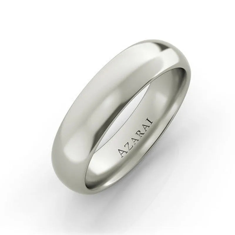 A straightforward comfort-fit Solis sterling silver wedding band CF with "AZARAI" engraved on the inside.