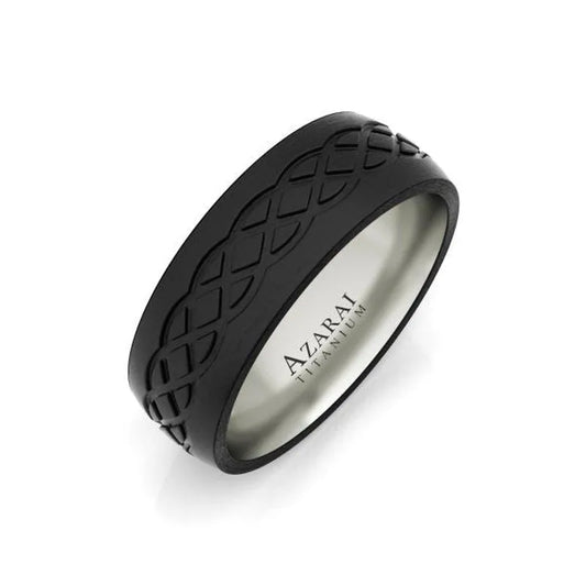 The Huntley carbon fibre wedding band, currently on clearance, features a black titanium design with an engraved geometric pattern and "AZARAI TITANIUM" inscribed on the inside, making it a bold statement for a men's wedding band.