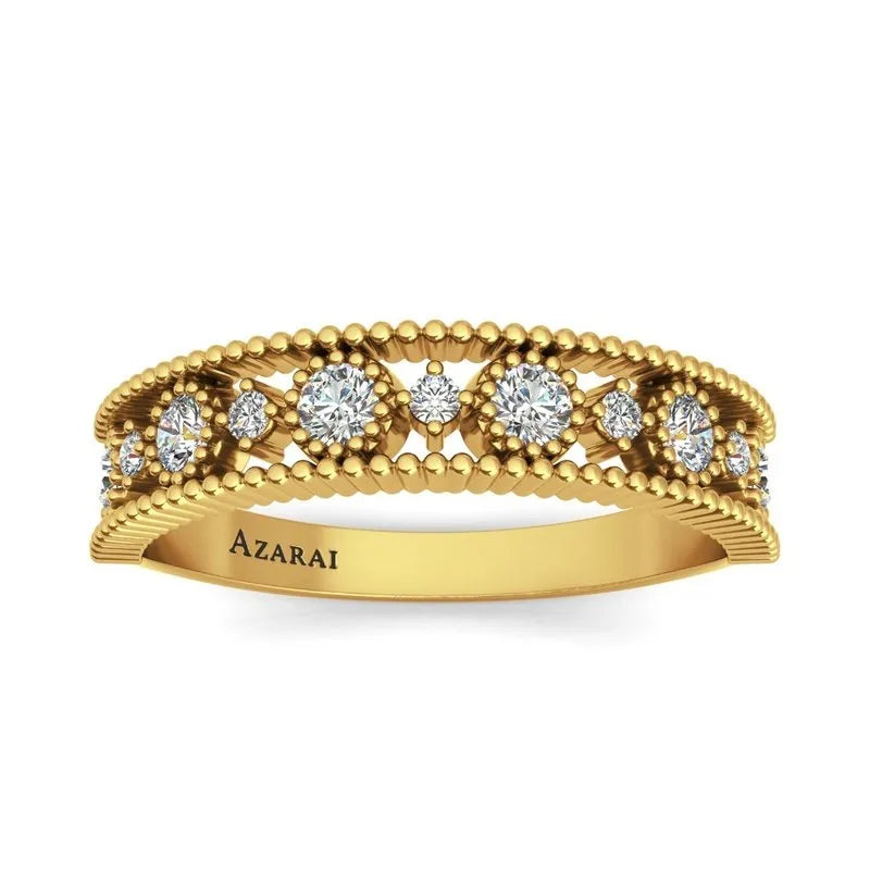 Isolde 9kt gold wedding band with diamonds.