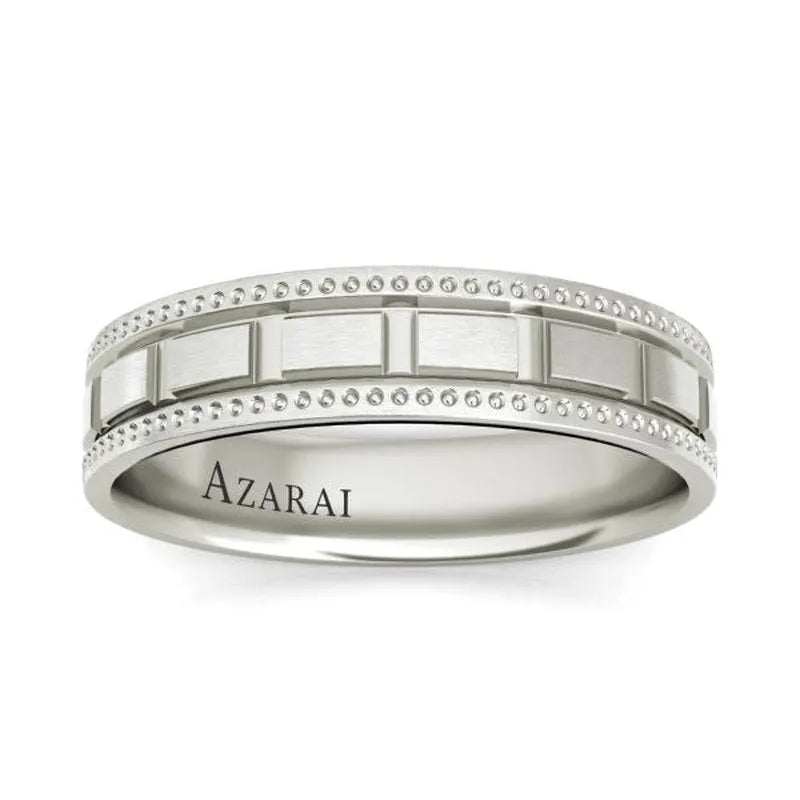 The Langston sterling silver wedding band showcases a sophisticated men's design with a patterned band featuring square motifs and beaded edges, and the word "AZARAI" elegantly engraved on the inside.