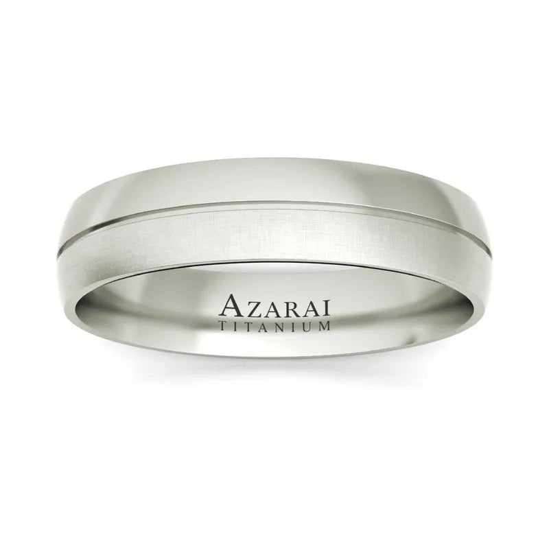 The Madison titanium wedding band features a smooth, polished finish and is inscribed with "AZARAI TITANIUM," making it perfect for a ceremony inspired by Madison.