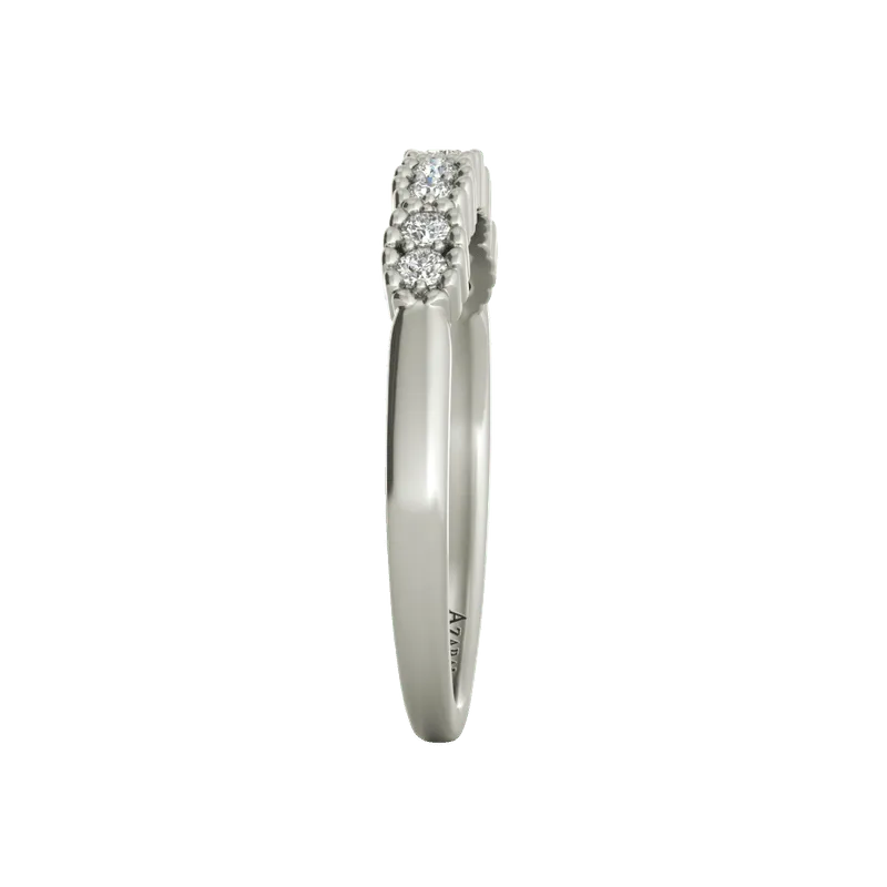 Side view of the Nina sterling silver wedding band showcasing a row of small, round diamonds set on top, embodying timeless elegance.