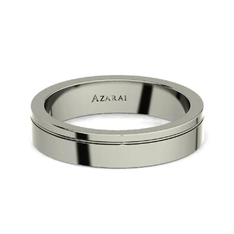 Silver Nova titanium wedding band ON CLEARANCE with engraved name "azrai" on the interior surface.