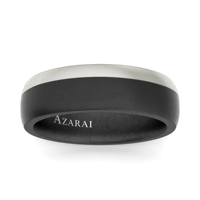 A sleek Onyx Carbon Fibre Wedding Band with black and silver tones, engraved with "AZARAI" on the inside.