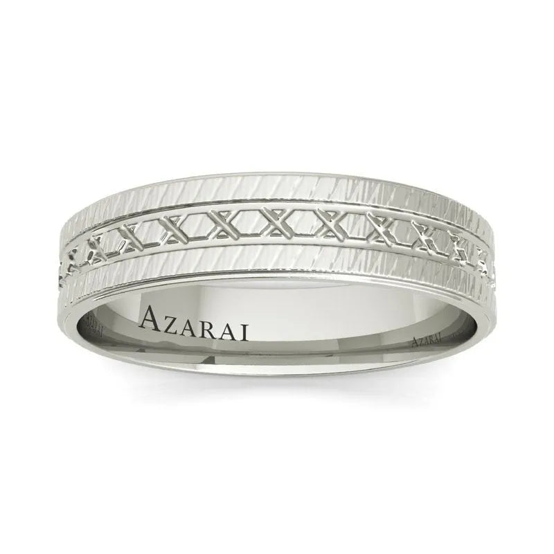 The Parker sterling silver wedding band features a textured band and is engraved with the name "AZARAI" inside, making it perfect as a men's wedding ring.