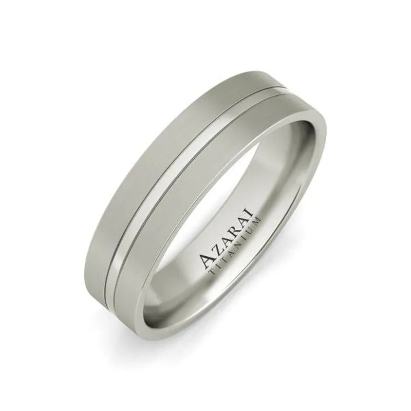 Featuring a straightforward design in silver, this Riley titanium wedding band exudes elegance effortlessly, with "AZARAI TITANIUM" engraved on the inside.