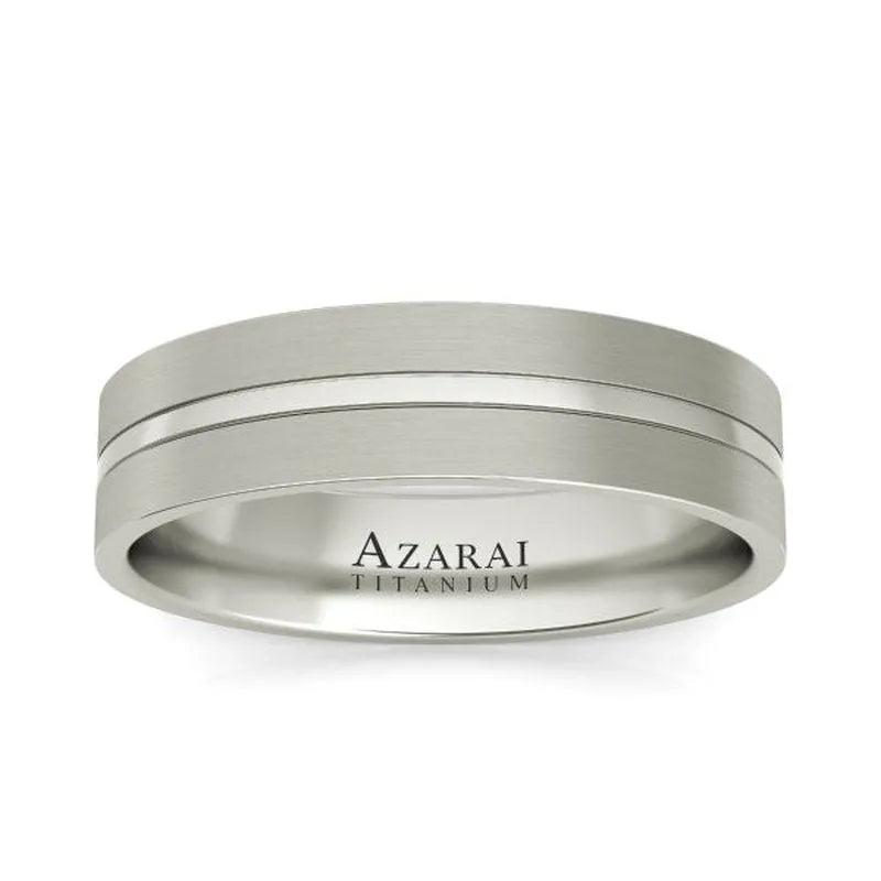 The Riley titanium wedding band is a silver titanium ring featuring a smooth matte finish and a subtle groove at the center. The inner band is engraved with "AZARAI TITANIUM," making it an exceptional choice for those seeking a stylish yet understated accessory.