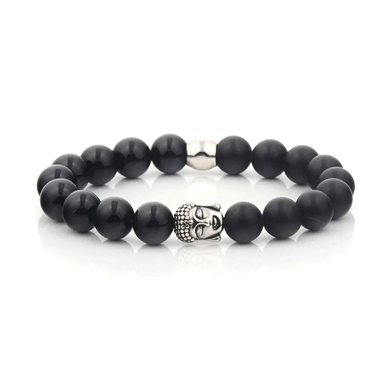 The Roka beaded bracelet for men, adorned with black semi-precious beads and a captivating silver Buddha charm alongside a single silver bead, is an ideal accessory. Elegantly packaged in a gift box, it is a thoughtful gift for any occasion.