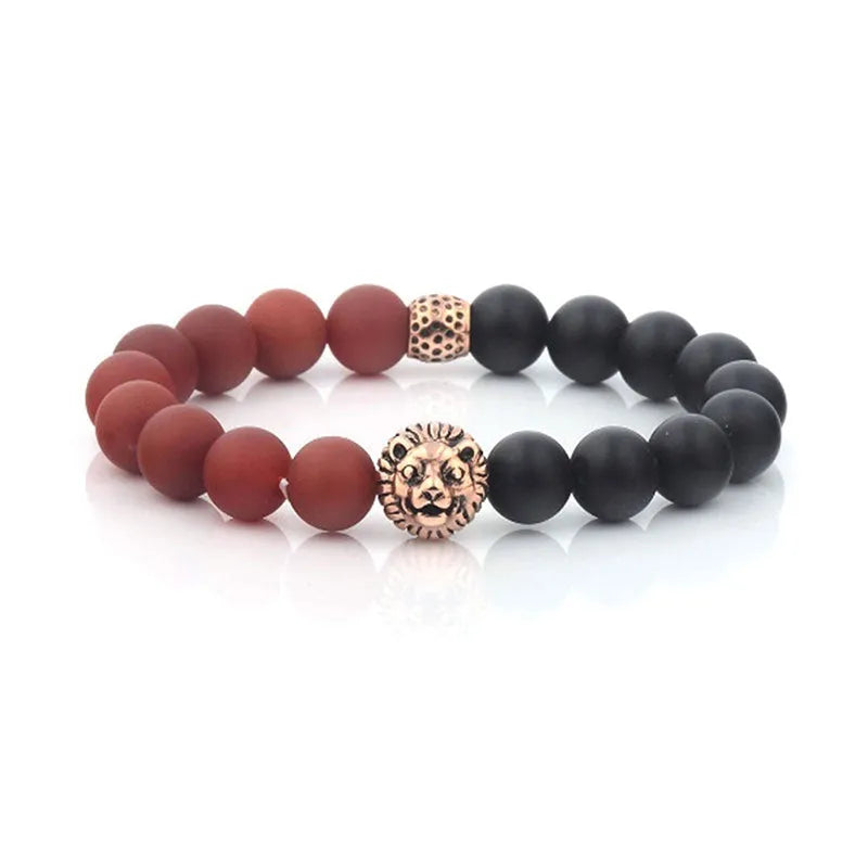 The Roka beaded bracelet for men, adorned with semi-precious brown and black matte beads and a gold lion head charm at the center, makes a stylish accessory. It is elegantly packaged in a gift box.