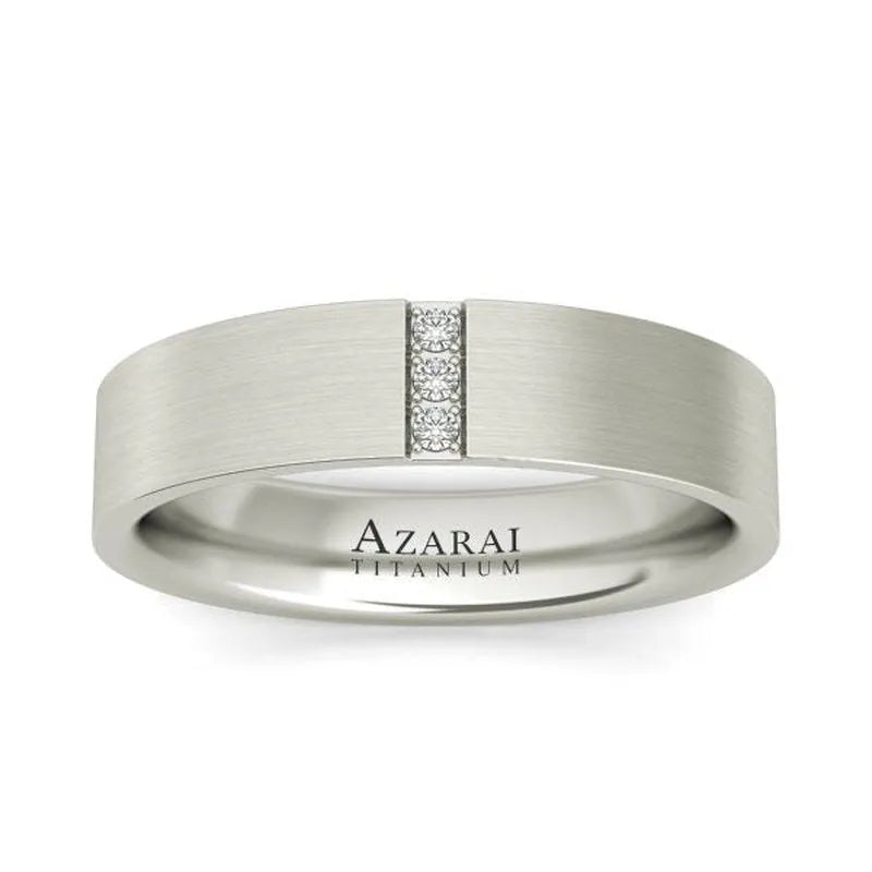 Presenting the exquisite Rowan titanium wedding band, now on final sale clearance. This elegant piece showcases a matte finish with a vertical row of small diamonds at its center and an inner band engraved with "Azarai Titanium," making it an unmissable deal.