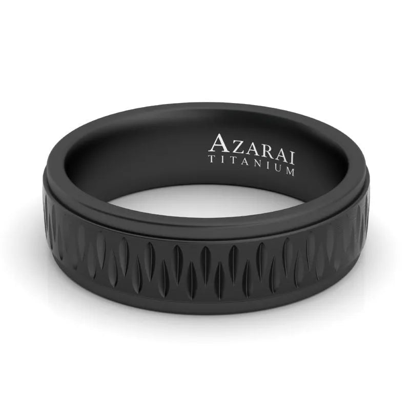 Introducing the Sable black titanium wedding band, designed with engraved patterns and featuring "AZARAI TITANIUM" inscribed on the interior, making it an ideal choice for a men's wedding band.