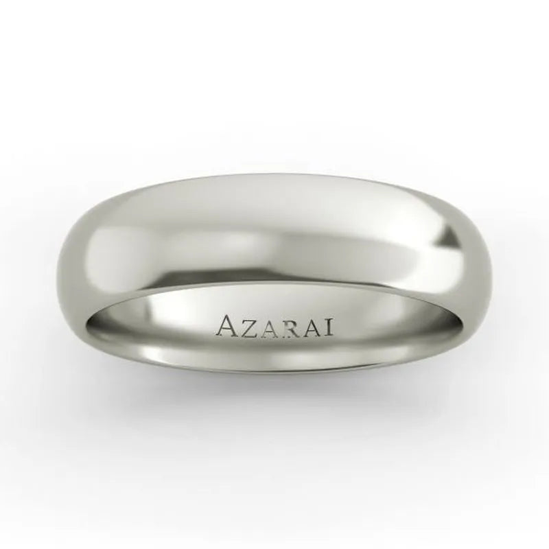 The Solis 18kt gold wedding band, measuring 5mm and elegantly engraved with "Azarai" on the inside, is beautifully displayed against a white background, capturing the essence of a timeless wedding band.