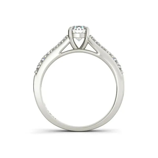 A stunning Sonora sterling silver engagement ring featuring a central diamond held by prongs, accompanied by smaller diamonds along the band.