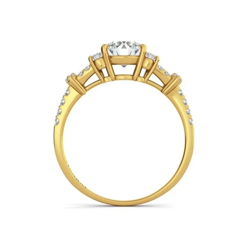 The Sweetheart 14kt gold engagement ring showcases a central round diamond, elegantly enhanced by smaller diamonds along the band, offering timeless elegance that's truly captivating.